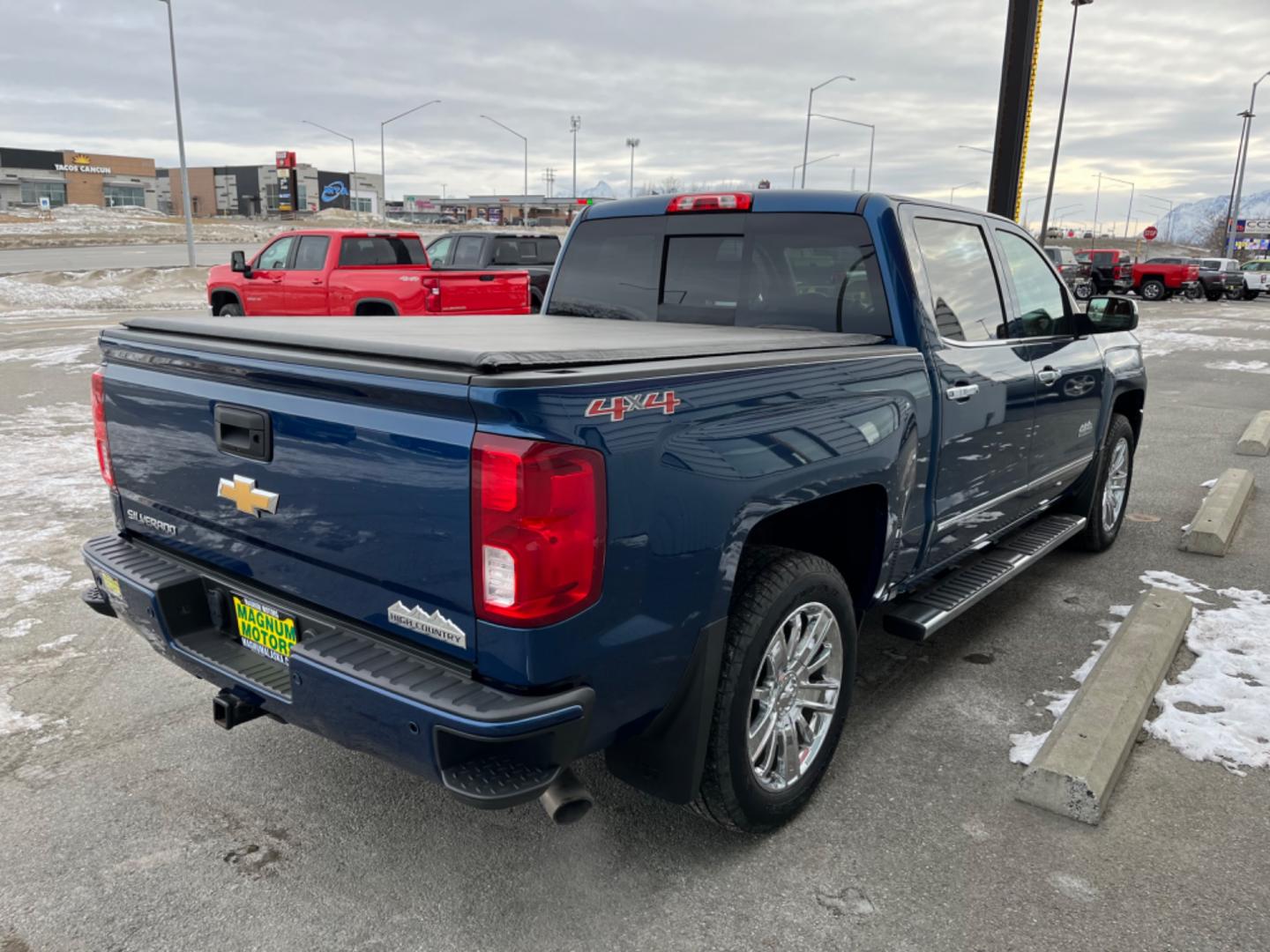 2017 Blue /black leather Chevrolet Silverado 1500 High Country Crew Cab Short Box 4WD (3GCUKTEJ2HG) with an 6.2L V8 OHV 16V engine, 6A transmission, located at 1960 Industrial Drive, Wasilla, 99654, (907) 274-2277, 61.573475, -149.400146 - Photo#4